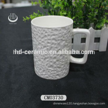 9oz ceramic coffee mug with square handle,embossed ceramic mug